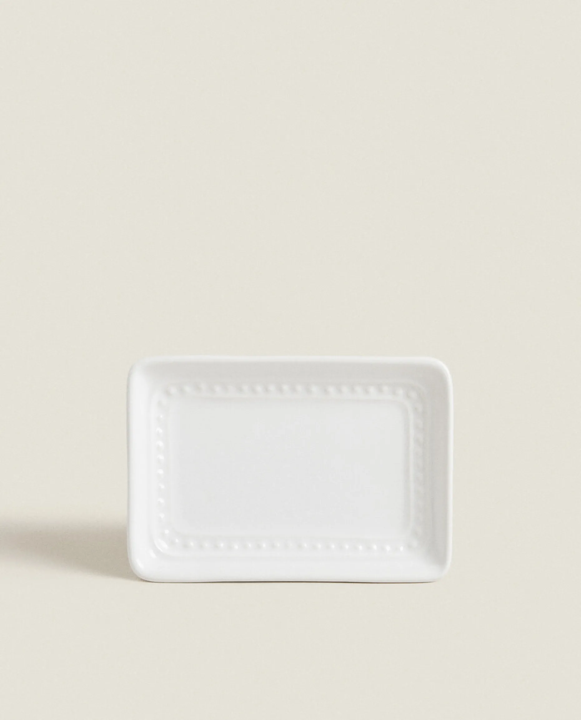 Ceramic Soap Dispenser With A Raised Design