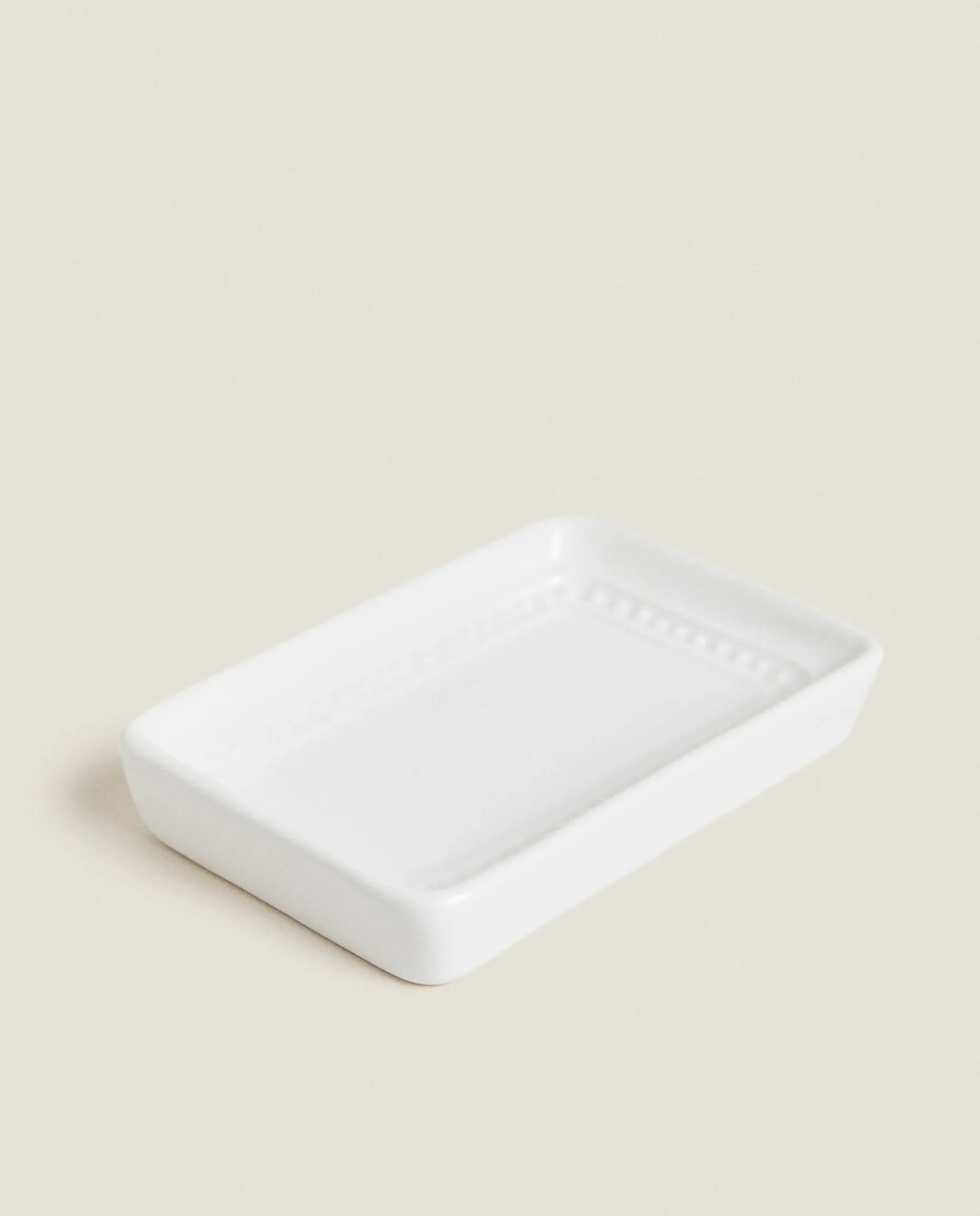 Ceramic Soap Dispenser With A Raised Design