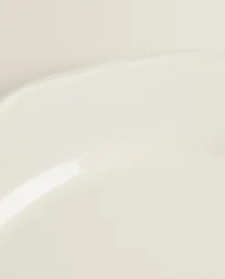Earthenware Dinner Dish With Raised-Design Edge