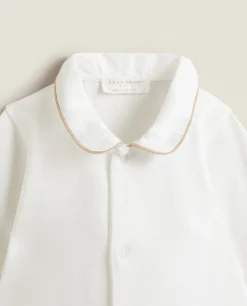 Footed Pajamas With Contrasting Piping